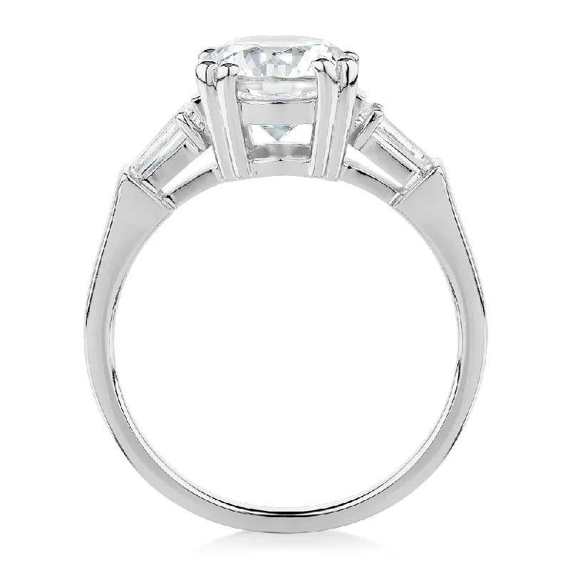 Round Brilliant and Baguette shouldered engagement ring with 2.46 carats* of diamond simulants in 10 carat white gold