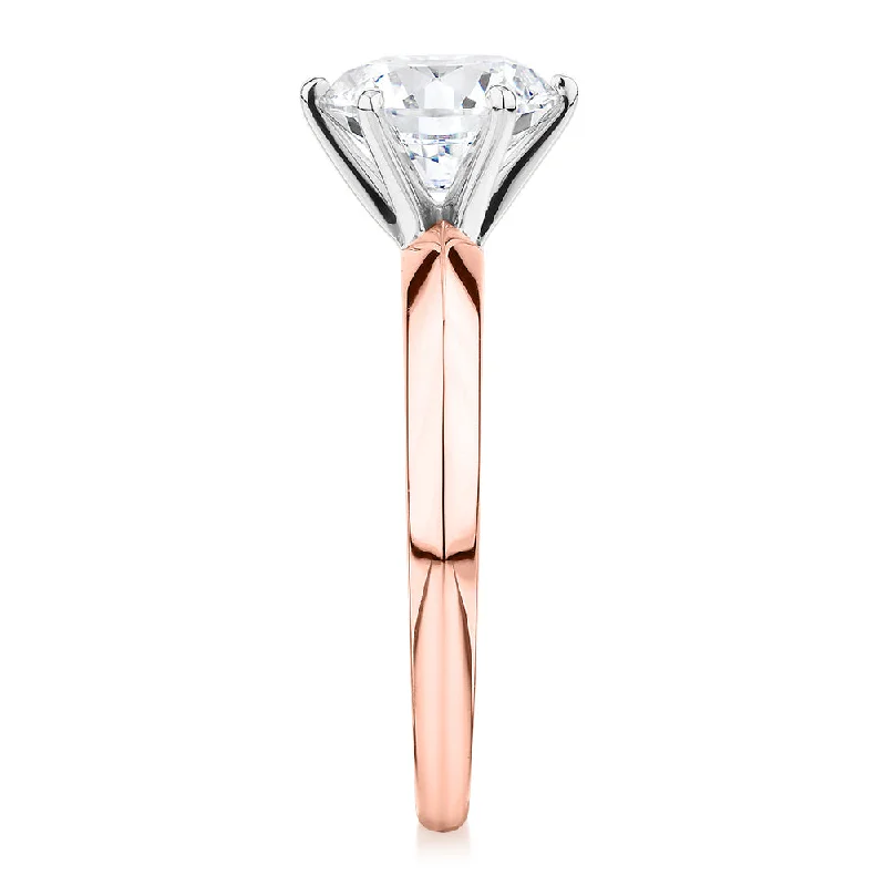 Round Brilliant solitaire engagement ring with 2 carat* diamond simulant in 14 carat rose and white gold